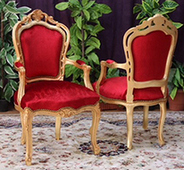 Fauteuil de table baroque avec accoudoirs et structure sculptée Meubles Dobois